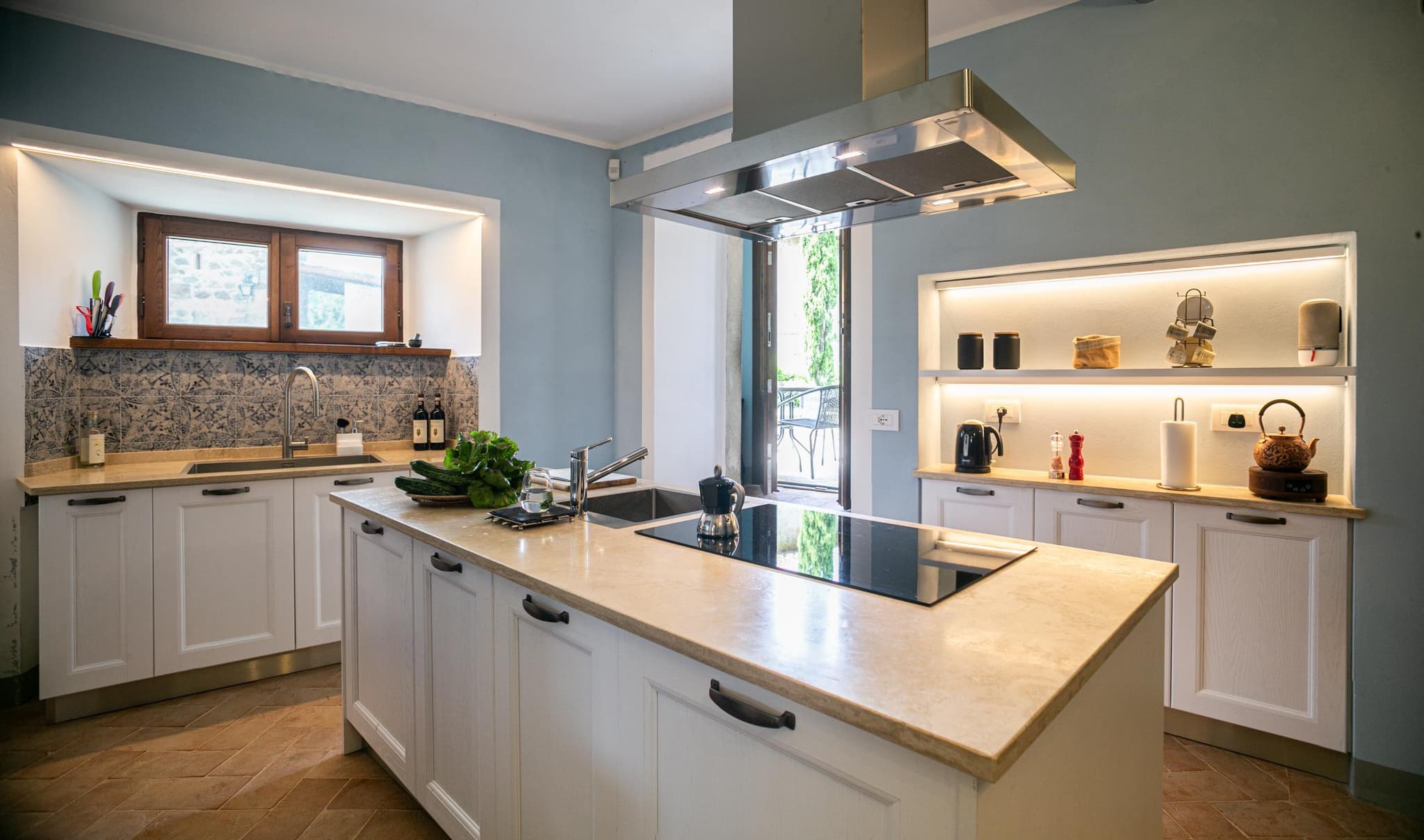 Main kitchen with island and induction hob