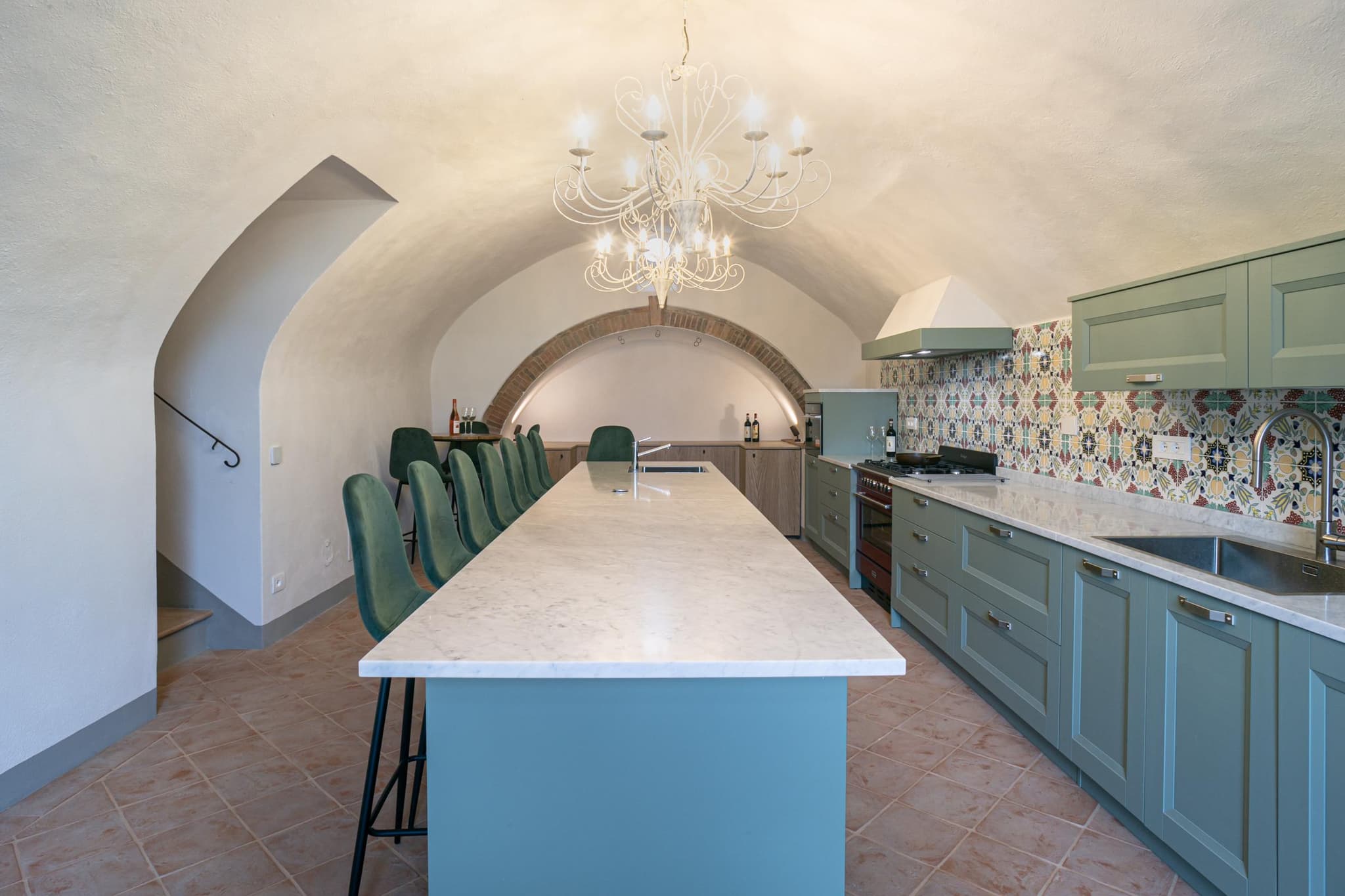 Vaulted cellar kitchen with marble island
